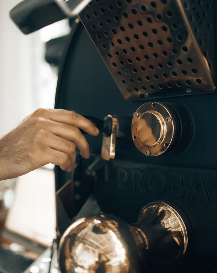 A drum roaster at work